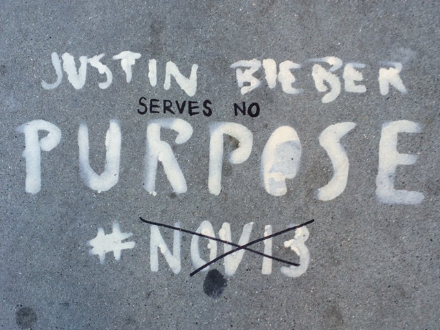 Illegal Justin Bieber graffiti (defaced with responsive graffiti) at Bush and Polk Streets, (Via Twitter at https://twitter.com/gabetron3030/status/670786809677246464)